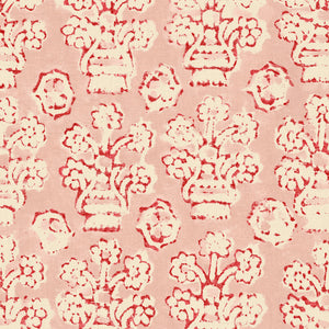 A jolly printed linen fabric in pink, red and cream