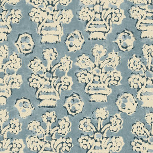 A jolly printed linen fabric in blue, black and cream