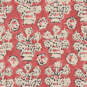 A jolly printed linen fabric in red, black and cream