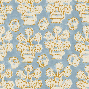 A jolly printed linen fabric in blue, yellow and cream