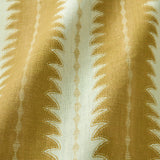 A printed linen fabric sample in yellow and off white featuring a striped fern design.