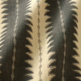 A printed linen fabric sample in black and off white featuring a striped fern 