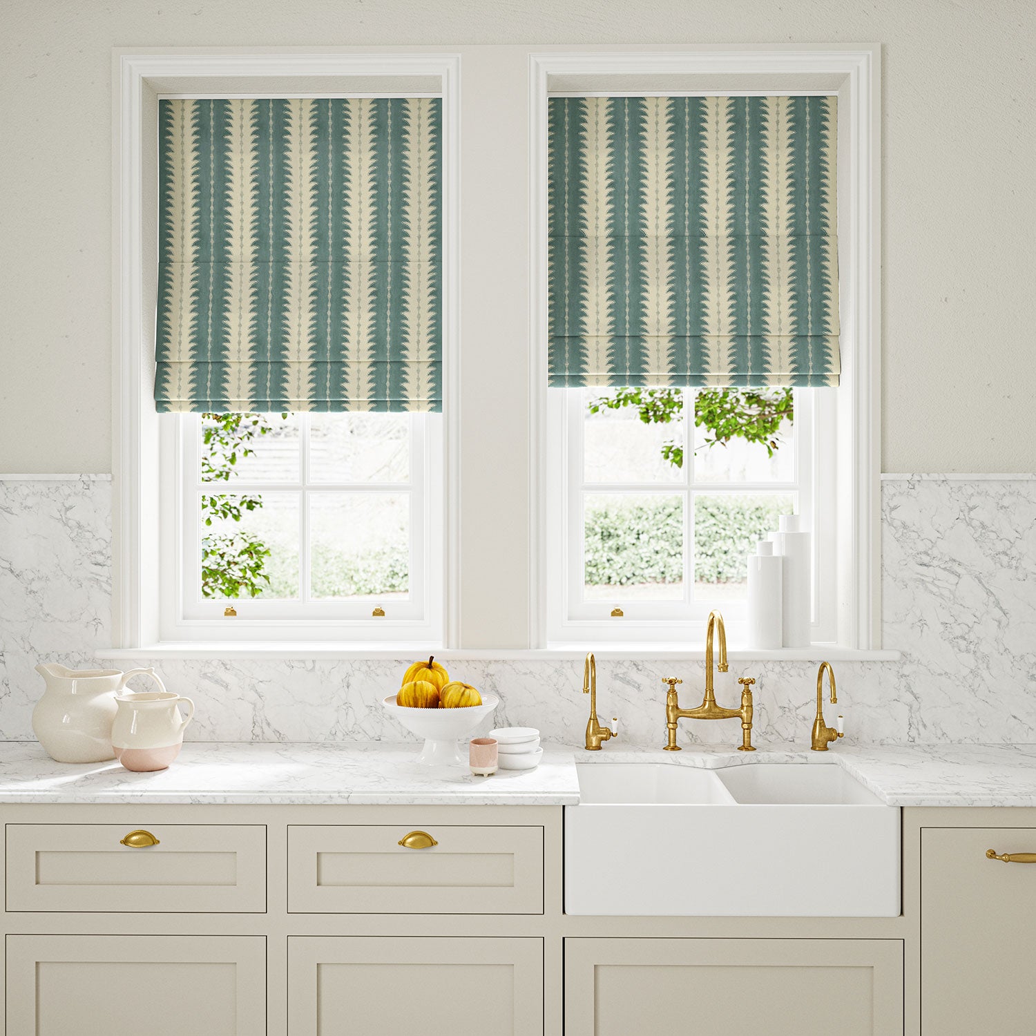 Blinds made from a printed linen fabric in blue and off white, featuring a striped fern design.