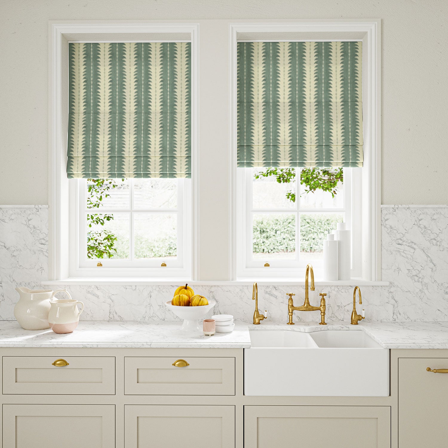 Blinds made from a printed linen fabric in blue and off white, featuring a striped fern design.