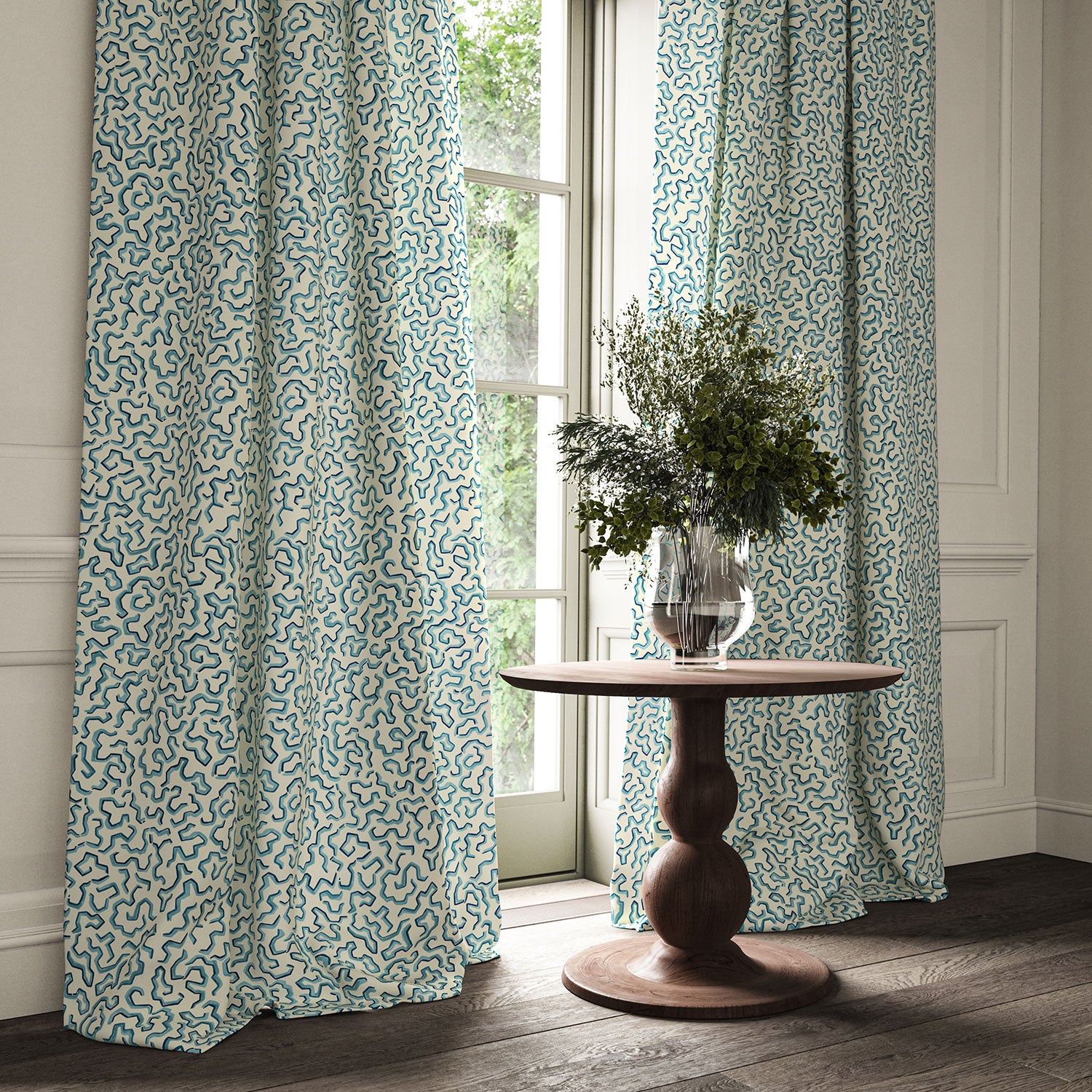 Curtains made from a printed linen fabric in blue and off white featuring a feel of a classic animal print.