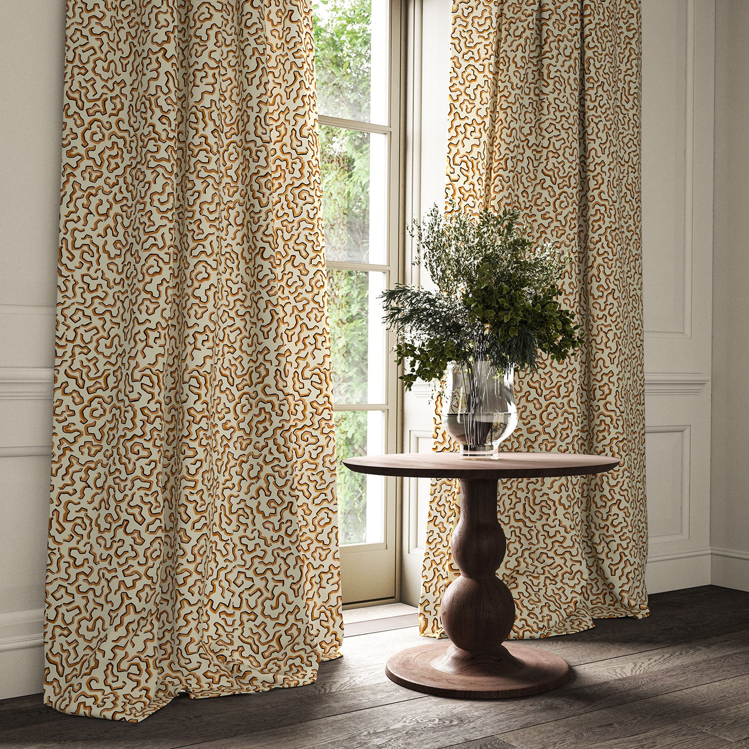 Curtains made from a printed linen fabric in brown, orange, and off white featuring a feel of a classic animal print.