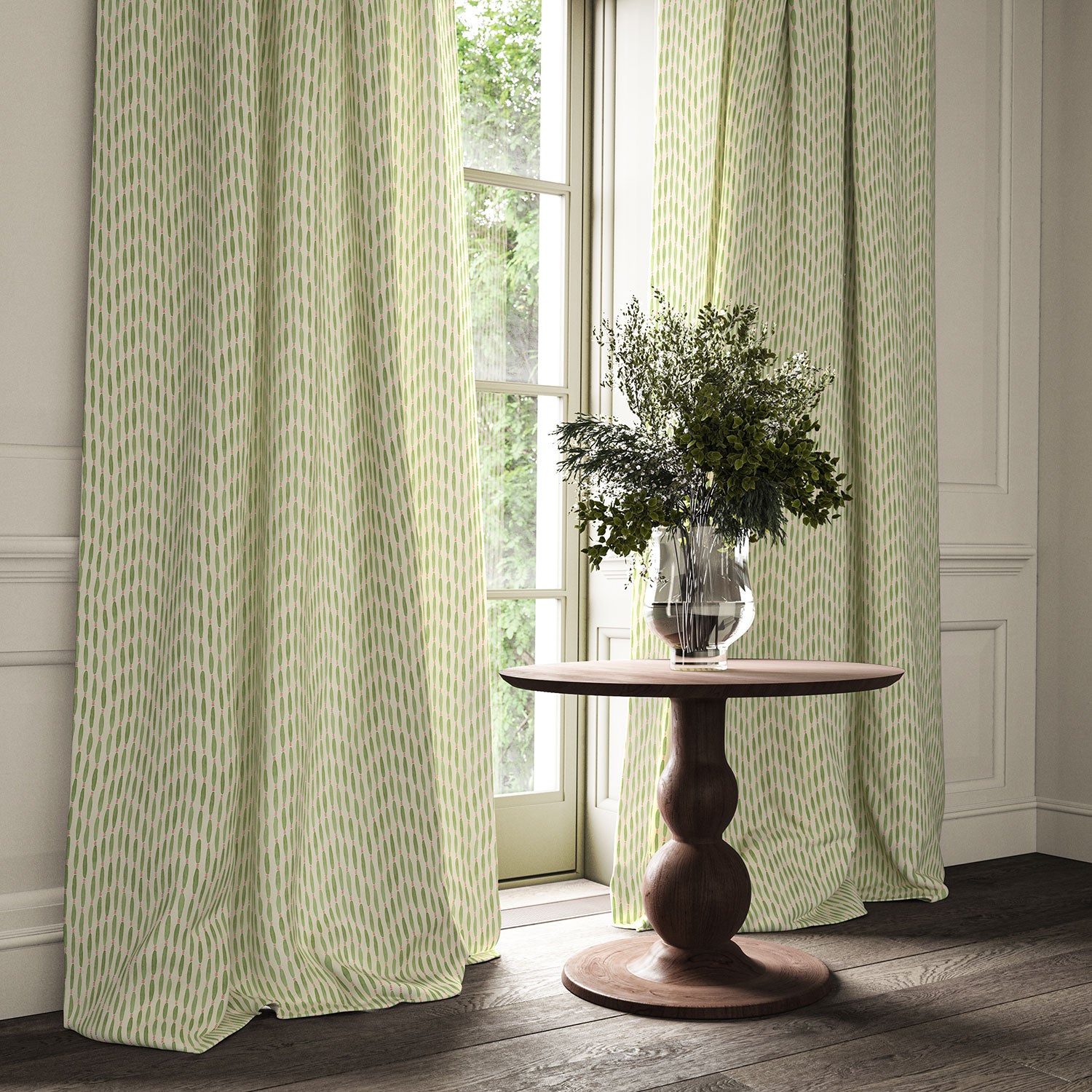 Curtains made from a printed linen fabric in green, pink, and off white featuring a Japanese print.