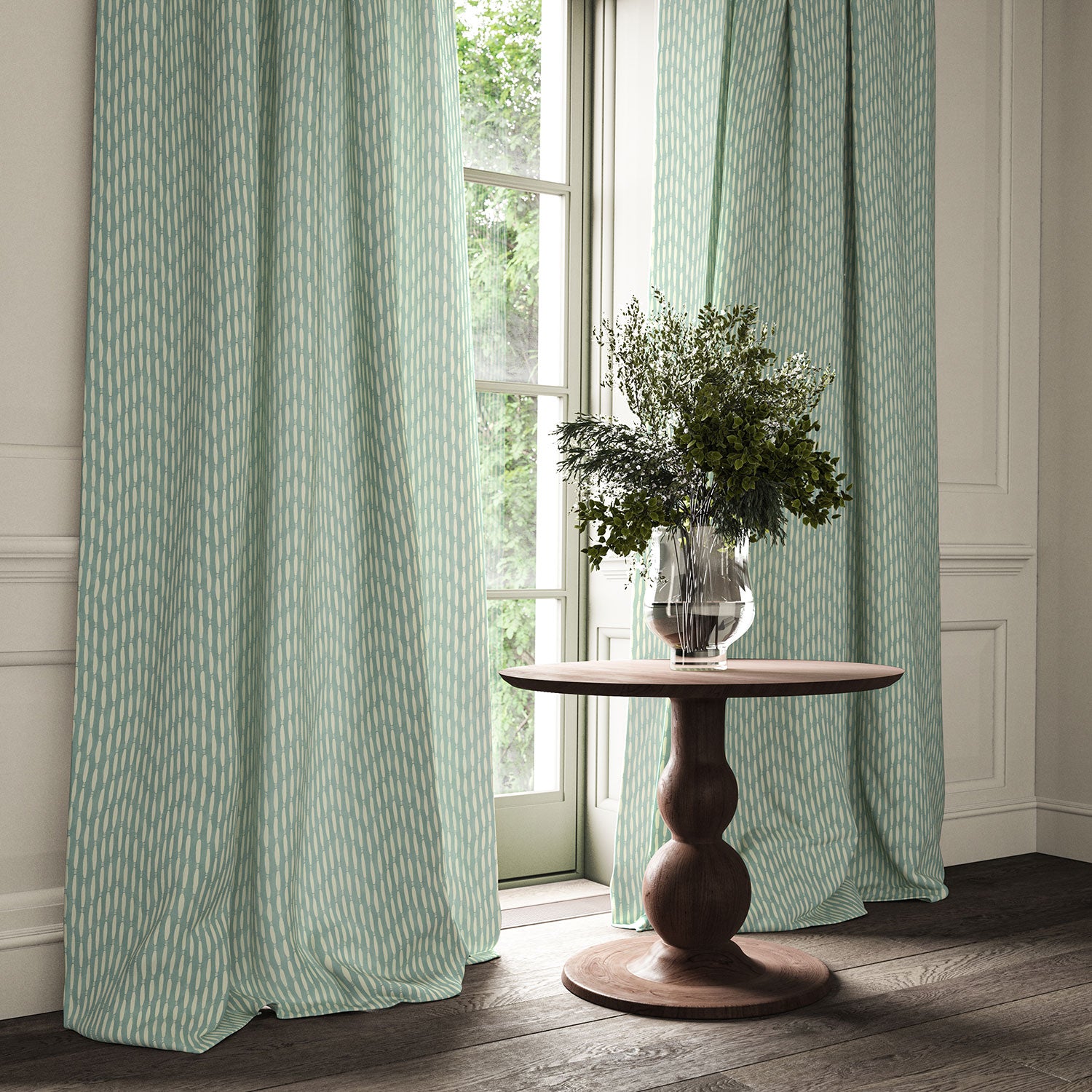 Curtains made from a printed linen fabric in blue and off white featuring a Japanese print.