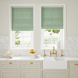 Blinds made from a printed linen fabric in blue and off white featuring a Japanese print.