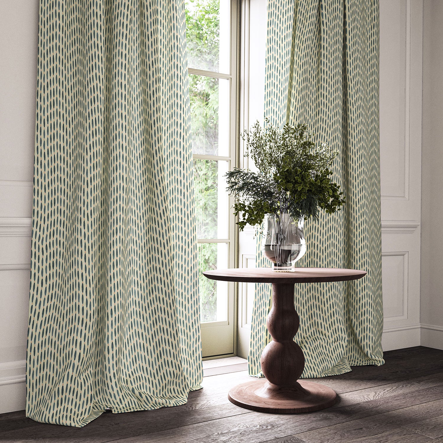 Curtains made from a printed linen fabric in blue, orange, and off white featuring a Japanese print.