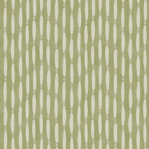 A printed linen fabric sample in green and off white featuring a Japanese print.