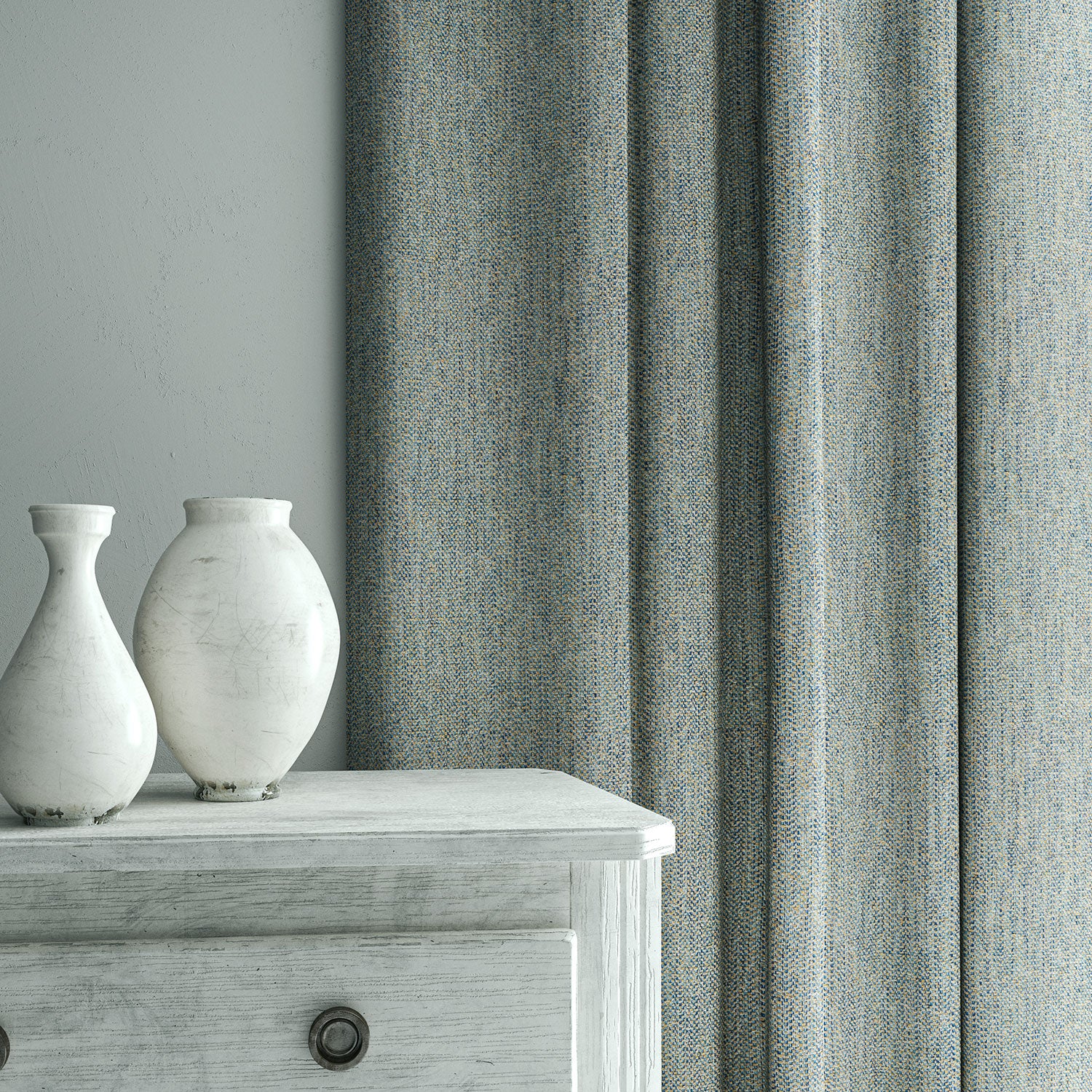Curtain in Loxley Bluestone by Linwood – blue Italian-woven fabric with rich texture and depth.