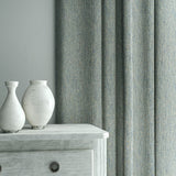 Curtain in Loxley Bluestone by Linwood – blue Italian-woven fabric with rich texture and depth.