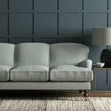 Sofa in Linwood’s Loxley Bluestone – Italian-woven blue fabric with tactile texture and versatility.