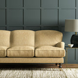Sofa in Linwood’s Loxley Cornsilk – Italian-woven yellow fabric with tactile texture and versatility.
