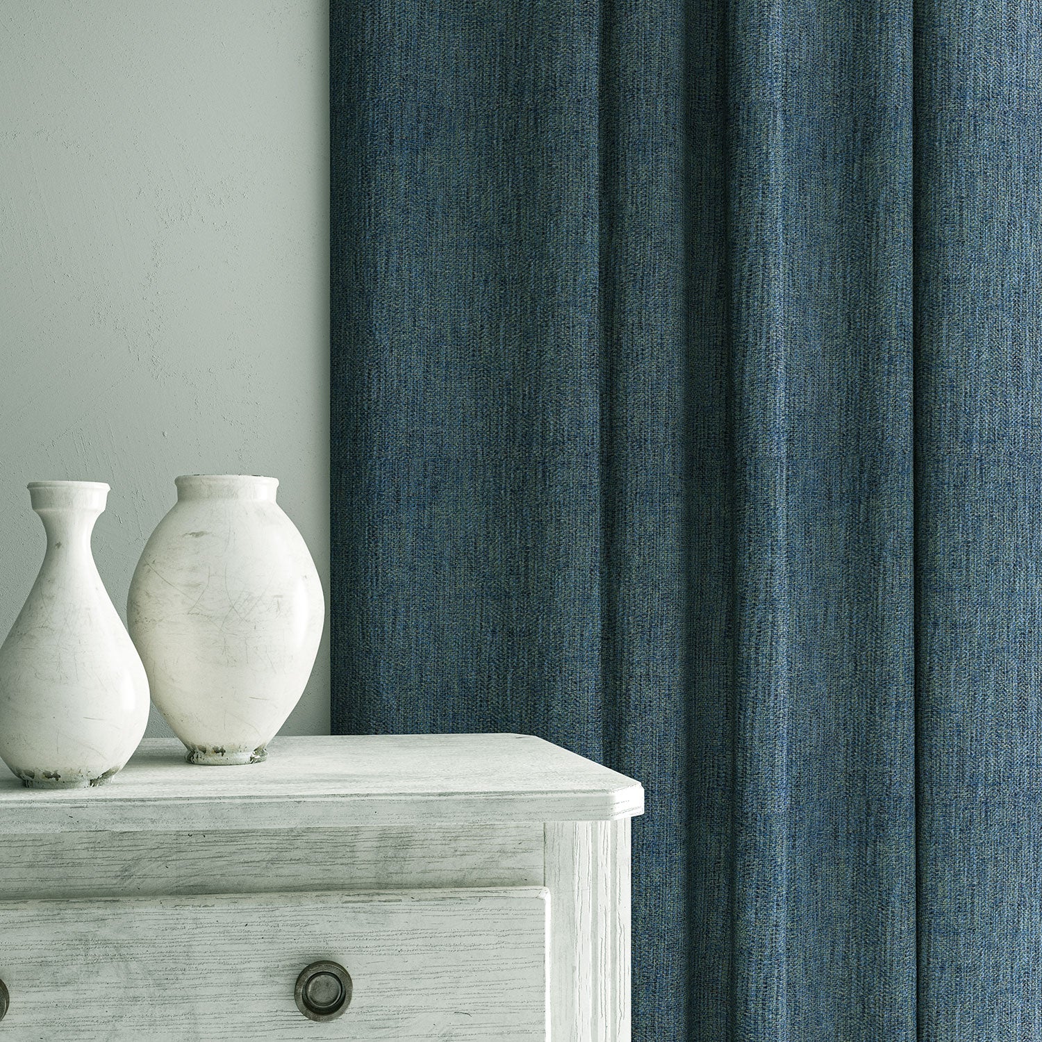 Curtains in Loxley Denim by Linwood – blue Italian-woven fabric with rich texture and depth.