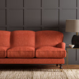 Sofa in Linwood’s Loxley Ember – Italian-woven red fabric with tactile texture and versatility.