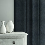 Curtains in Loxley Indigo by Linwood – blue Italian-woven fabric with rich texture and depth.