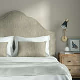 Upholstered headboard in Loxley Linen by Linwood – Italian-woven beige weave.


