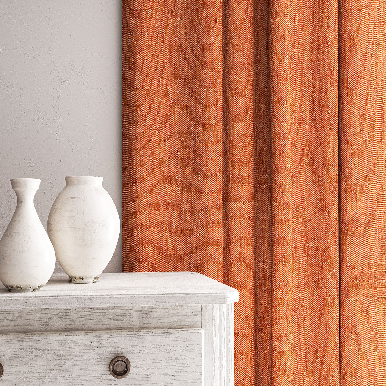 Curtain in Loxley Marmalade by Linwood – orange Italian-woven fabric with rich texture and depth.