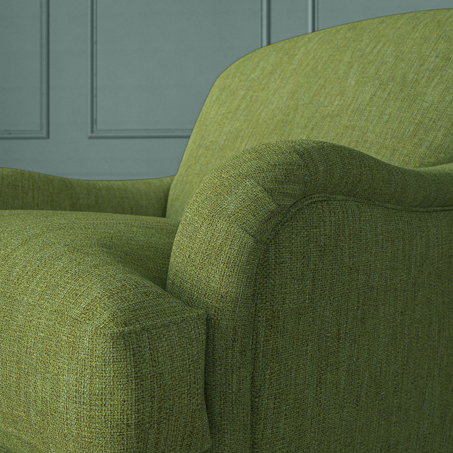 Close-up of armchair in Loxley Pistachio by Linwood – durable, Italian-woven natural fibre fabric in muted green.