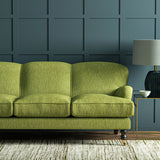 Sofa in Linwood’s Loxley Pistachio – Italian-woven green fabric with tactile texture and versatility.