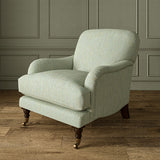 Armchair in Loxley Powder Blue by Linwood – durable, Italian-woven natural fibre fabric in muted blue.