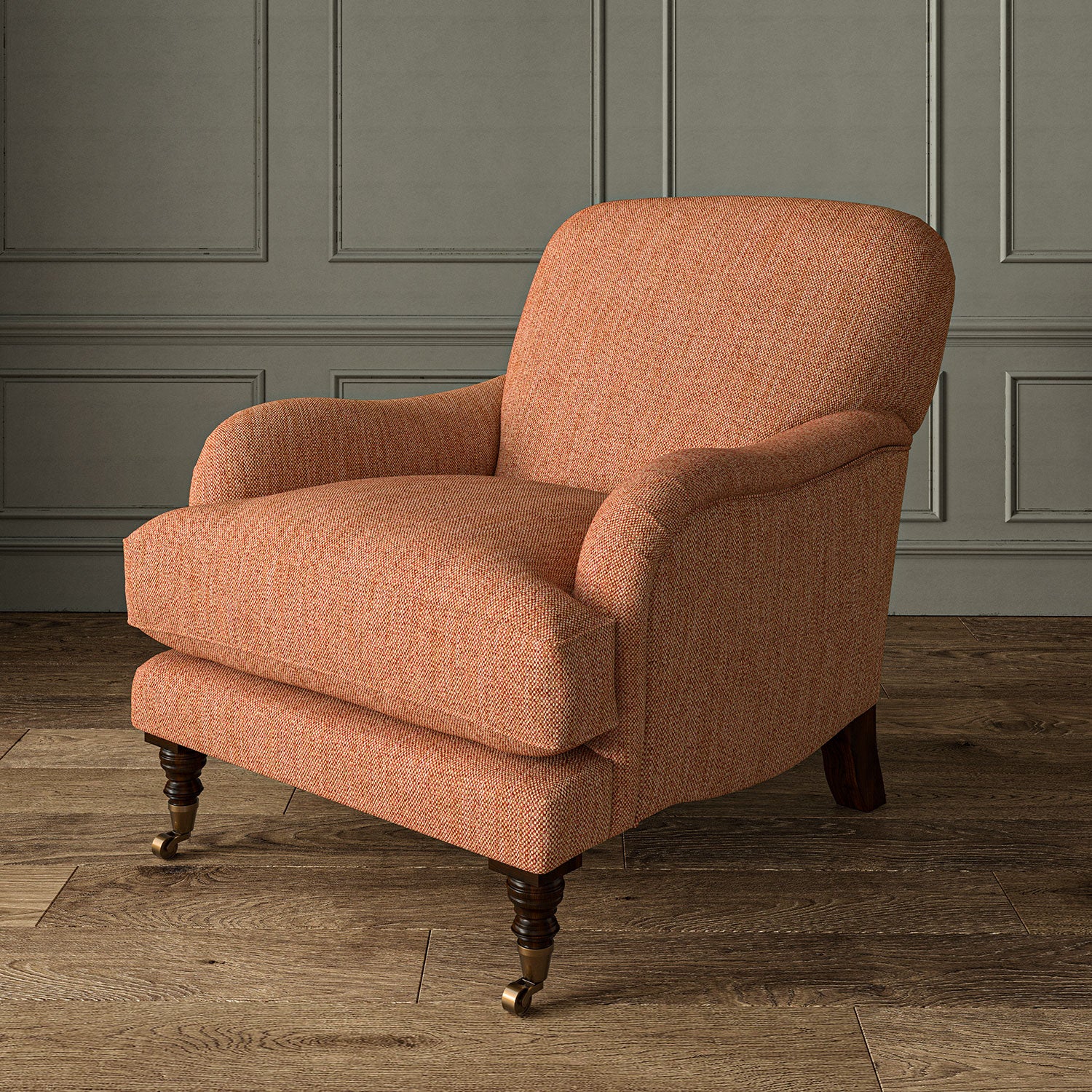 Close-up of armchair in Loxley Punch by Linwood – durable, Italian-woven natural fibre fabric in bold coral pink.