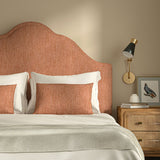 Upholstered headboard in Loxley Punch by Linwood – Italian-woven pink-red weave.