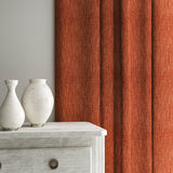 Curtain in Loxley Redwood by Linwood – red-brown Italian-woven fabric with rich texture and depth.