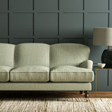 Sofa in Linwood’s Loxley Seagreen – Italian-woven green fabric with tactile 
texture and versatility.

