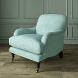 Armchair in Loxley Sky by Linwood – durable, Italian-woven natural fibre fabric in muted blue.