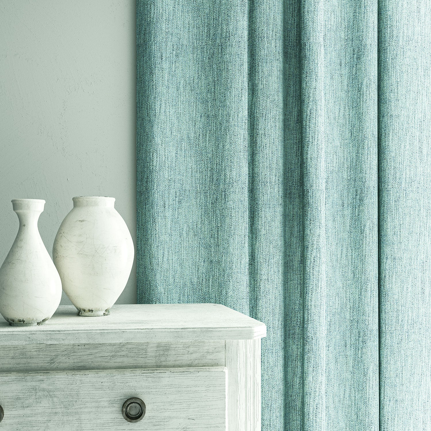 Curtain in Loxley Sky by Linwood – blue Italian-woven fabric with rich texture and depth.