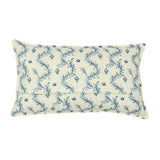 A blue and cream linen cushion with a marine-style pattern.