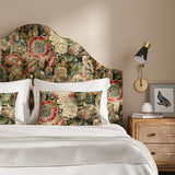 Headboard in a multicoloured printed velvet fabric featuring large, asymmetrical leaves and flowers.