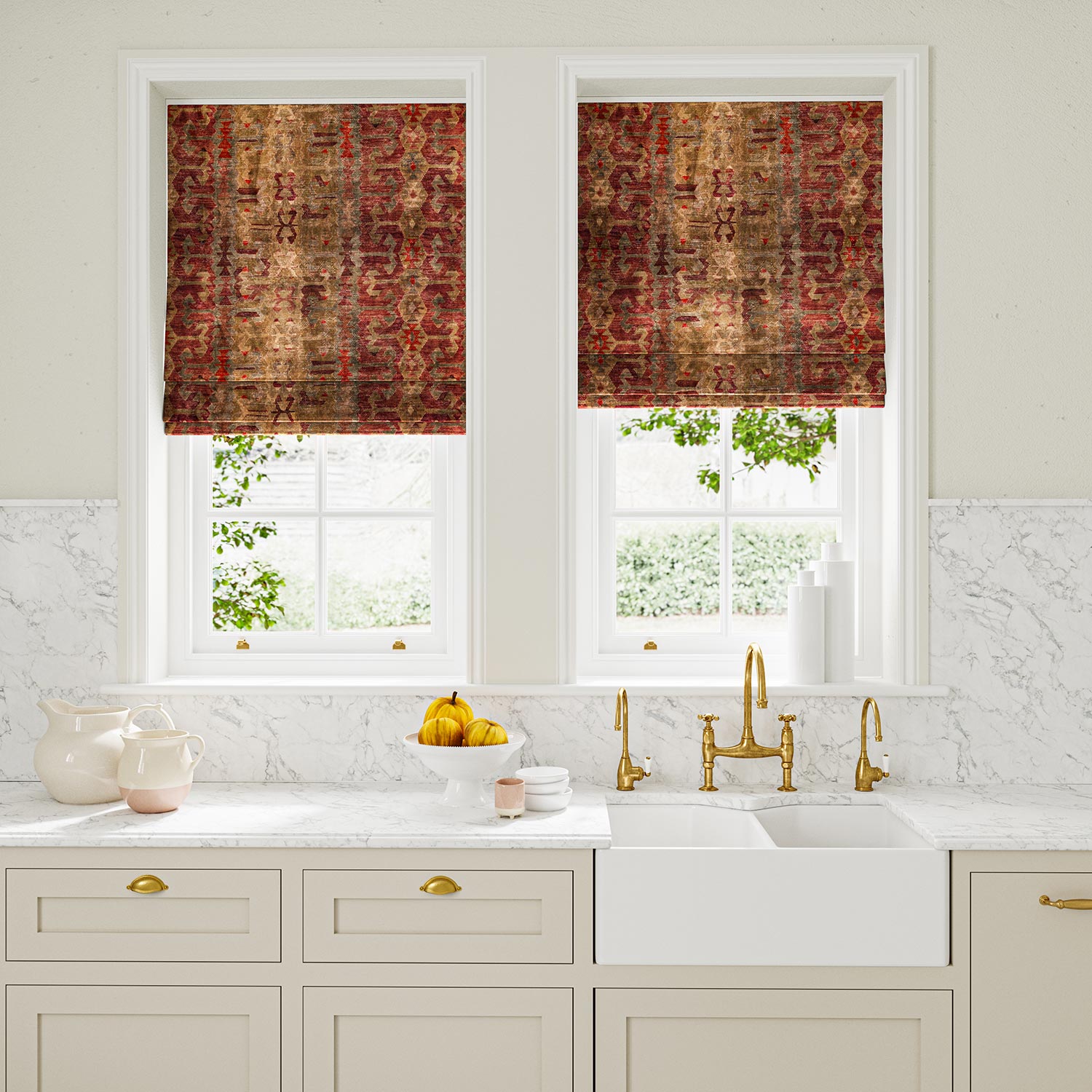 Blinds made from a printed velvet fabric in red and brown featuring a stripe kilim pattern.