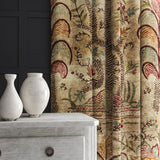 Curtain in a distressed printed velvet fabric with palms in sandy and red tones