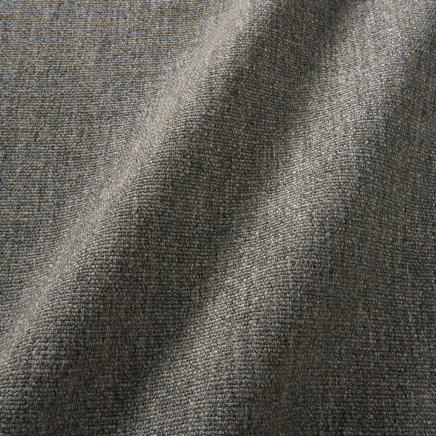 Sample of a plain luxurious woven fabric in grey.