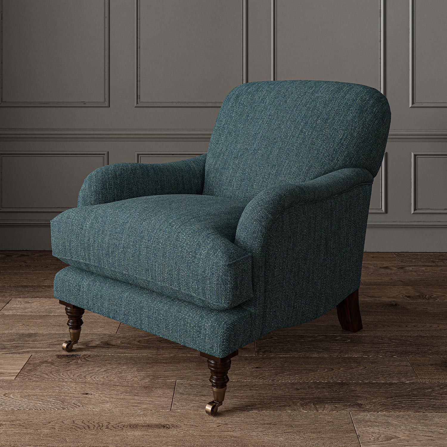 Chair upholstered in a plain luxurious woven fabric in blue.