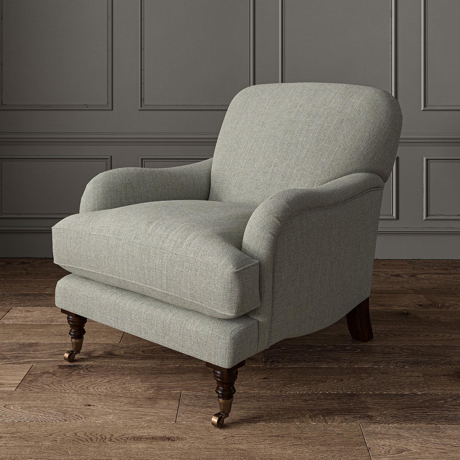 Chair upholstered in a plain luxurious woven fabric in grey.