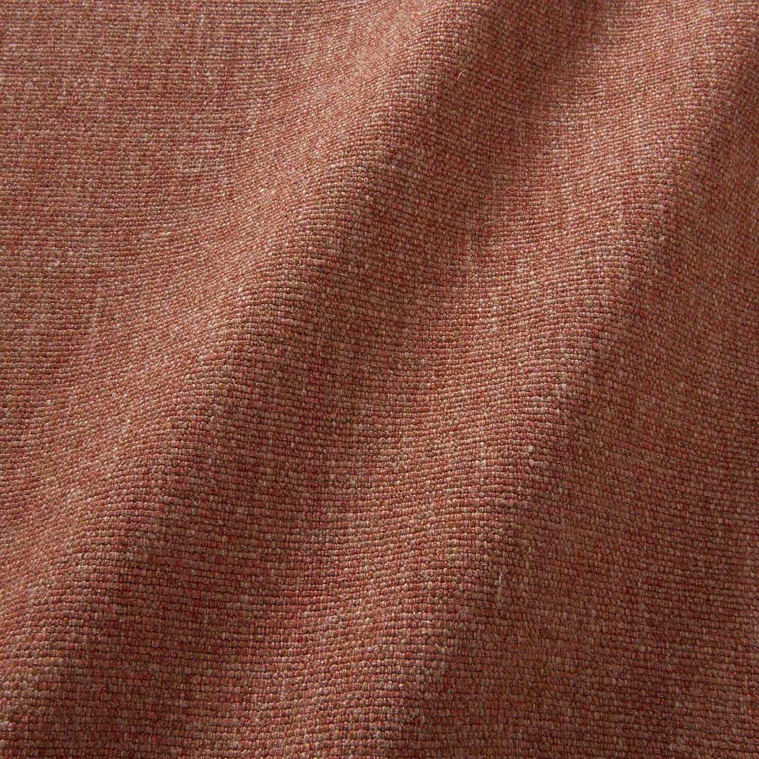 Sample of a plain luxurious woven fabric in red.