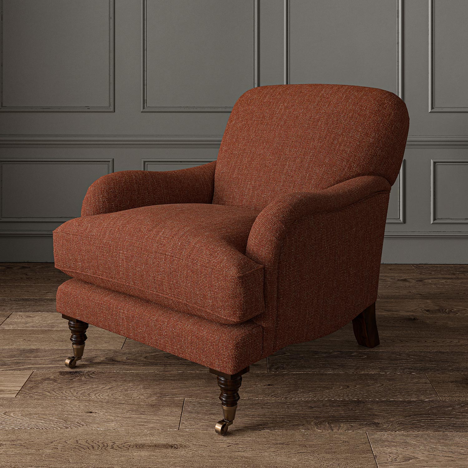 Chair upholstered in a plain luxurious woven fabric in red.