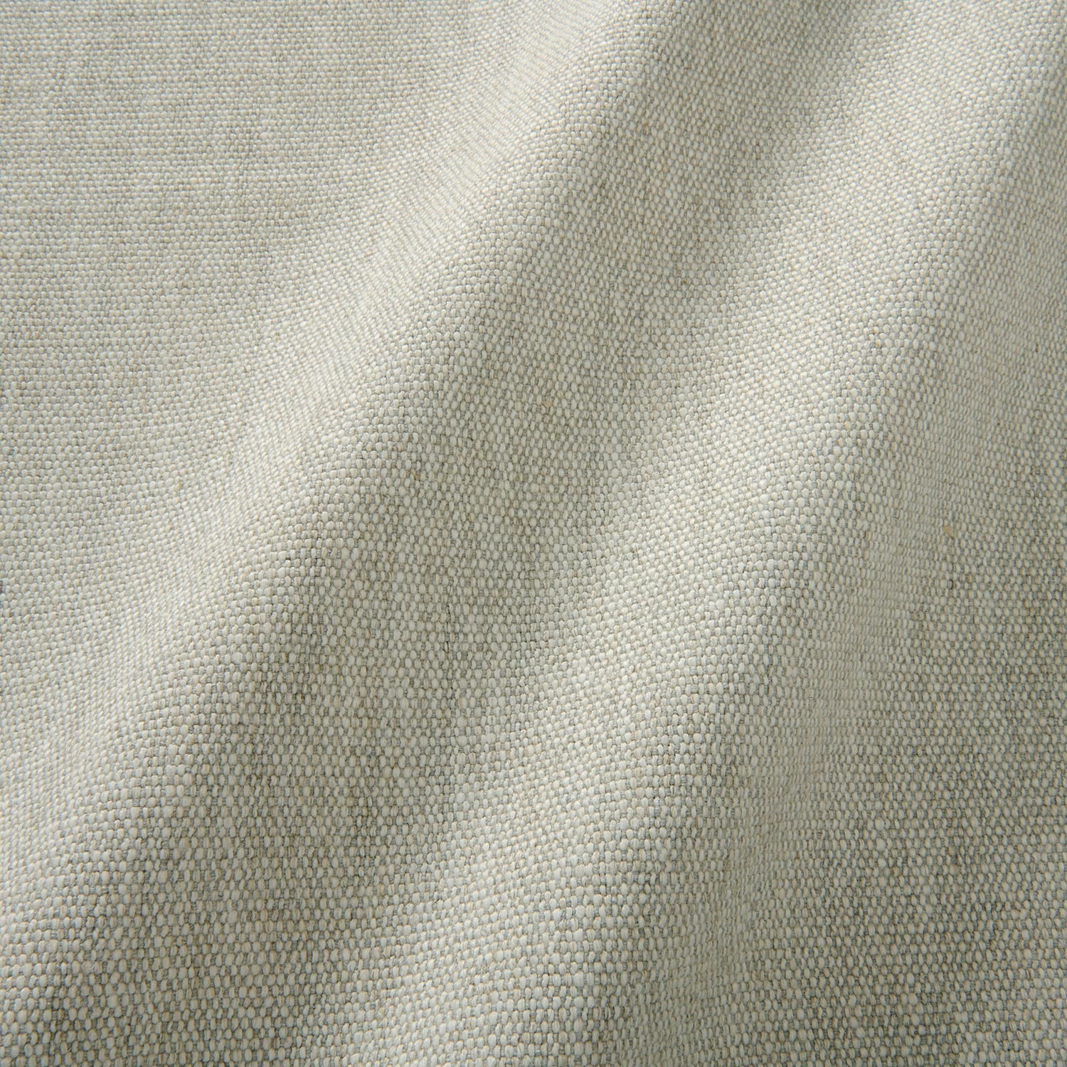 Sample of a plain luxurious woven fabric in cream.