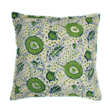 A green, blue and cream linen cushion with a stylised floral pattern.