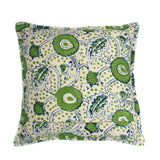 A green, blue and cream linen cushion with a stylised floral pattern.