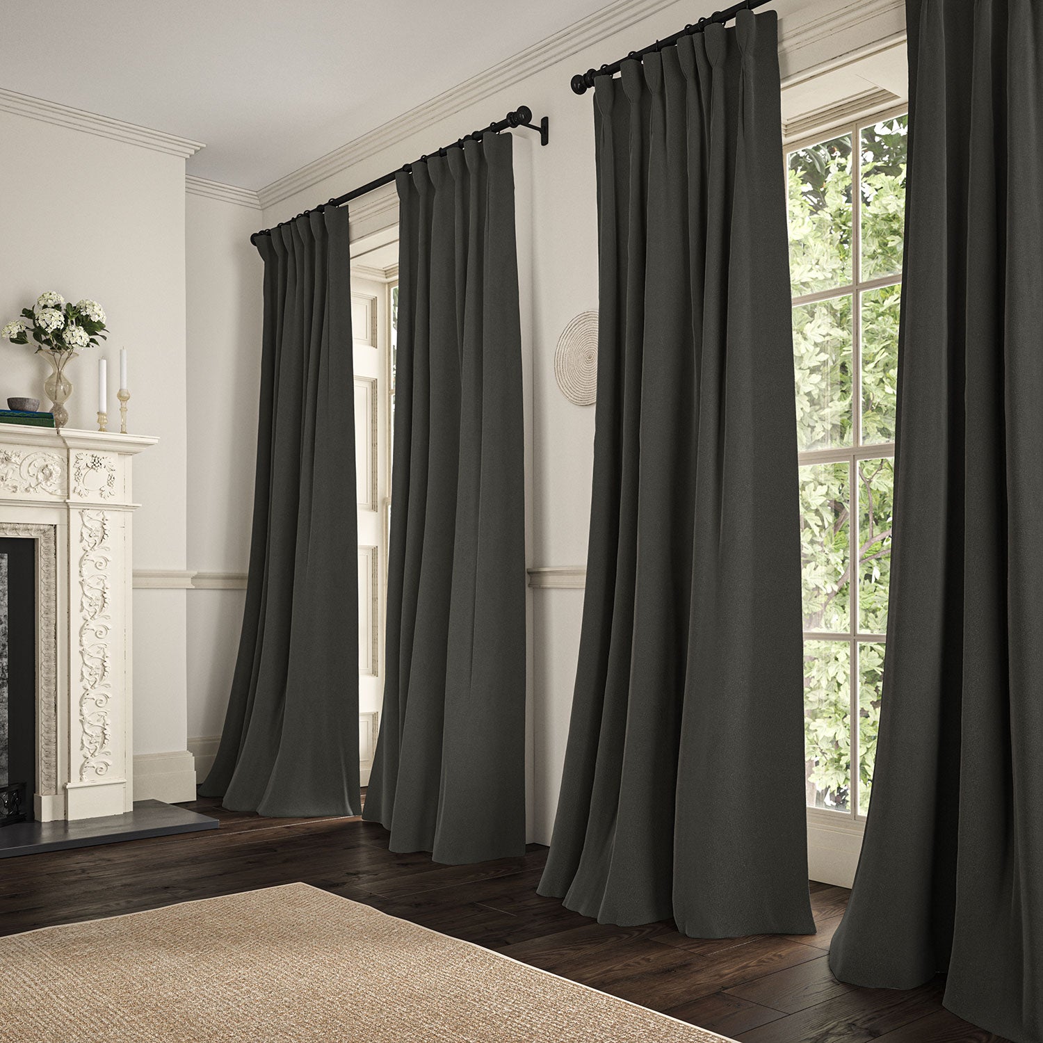 These dark neutral curtains are made from a 100% British wool woven fabric.