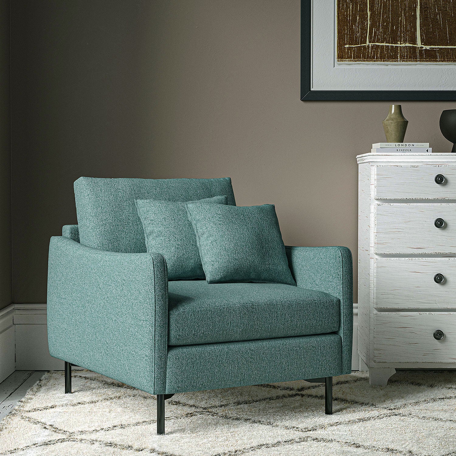 Chair covered in a boucle fabric in Fjord