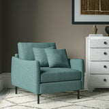 Chair covered in a boucle fabric in Fjord