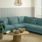 Sofa covered in a boucle fabric in Fjord