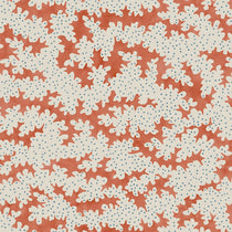 A printed linen fabric sample in orange, blue and off white featuring a stylized coral pattern.